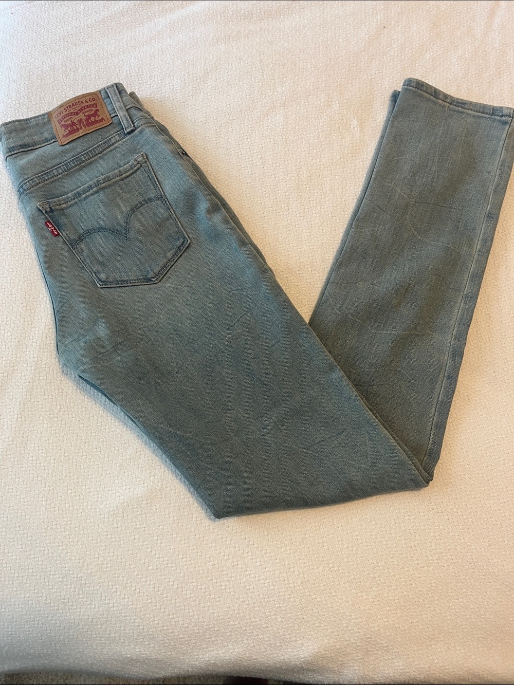 Levi's muted teal denim jeans
